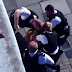 Footage filmed in UK shows policeman punching suspect multiple times while 3 other officers hold him down (video) 