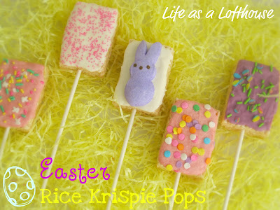 Easter Rice Krispie Pops are rice Krispie treats dipped in candy coating and covered in sprinkles and peeps. Life-in-the-Lofthouse.com