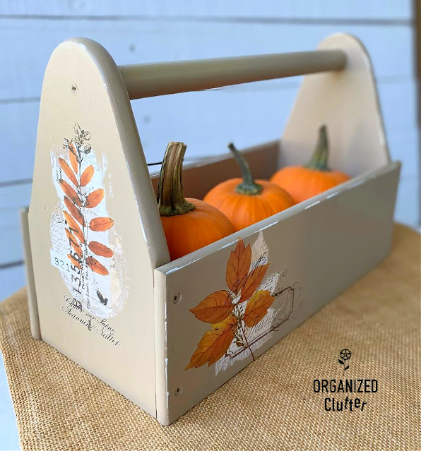 Photo of a toolbox decorated with fall decor transfers.