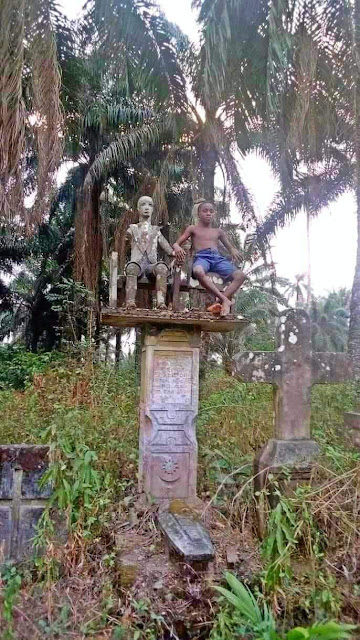"The next generation will have no regard for the 'gods'" - Nigerian pastor says as he shares pictures of a boy sitting beside a deity in a shrine