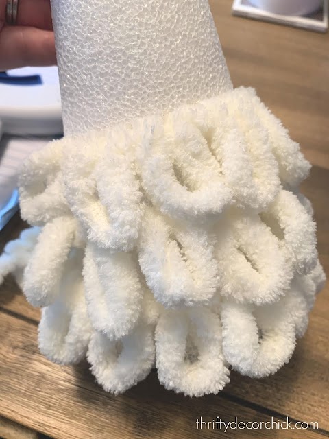 Fluffy yarn on foam cone