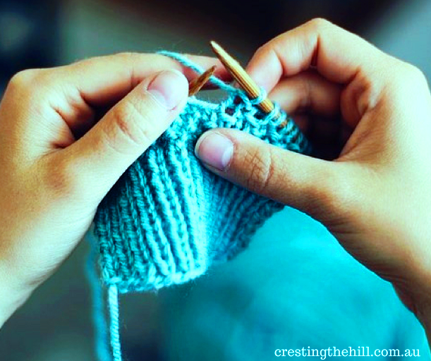 when the weather outside is frightful it's time to warm up with a little knitting