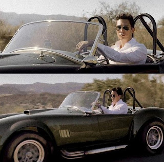 Picture of Daniel Henney riding a classic car