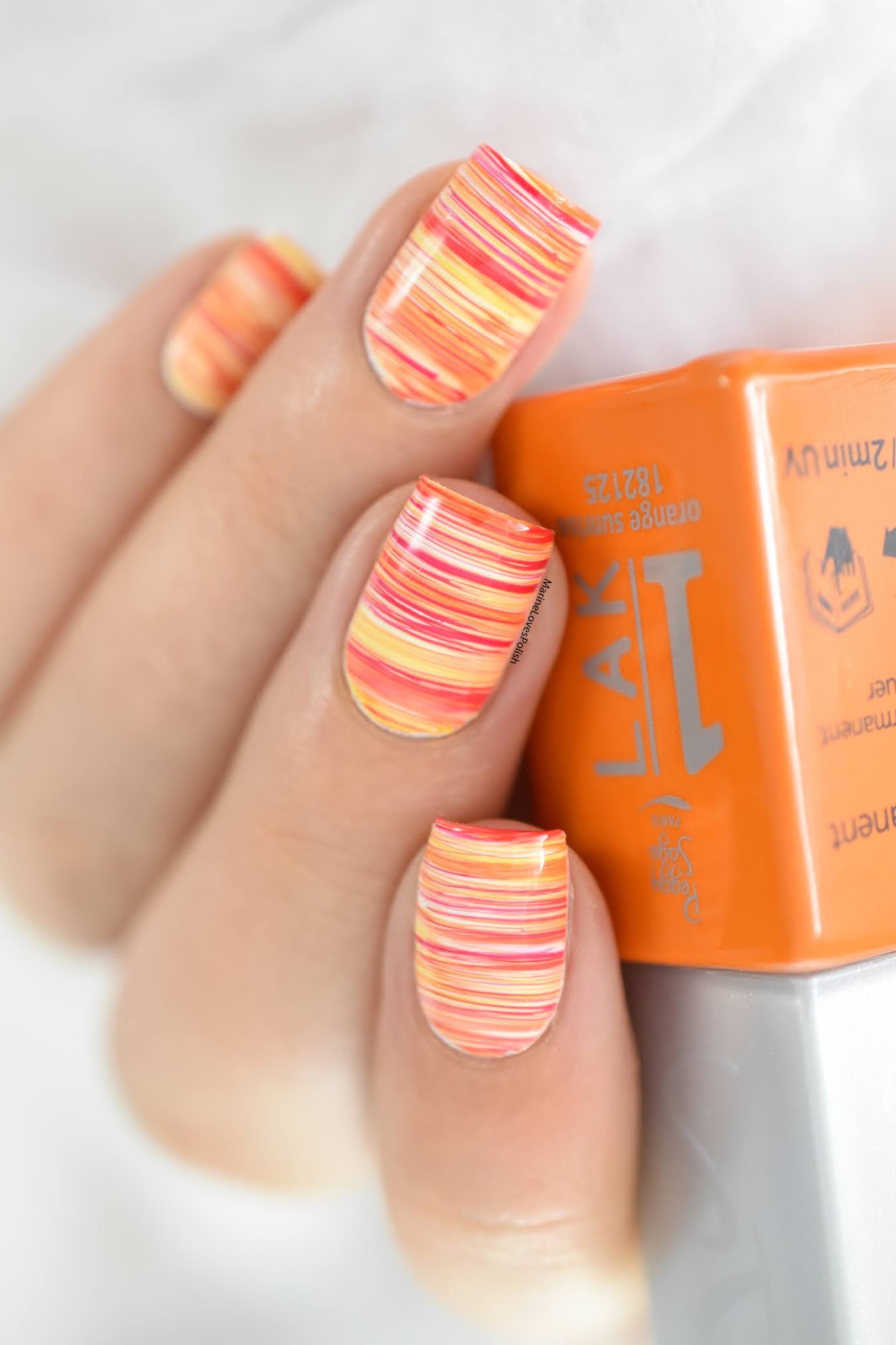 Summery sunset fan brush nail art