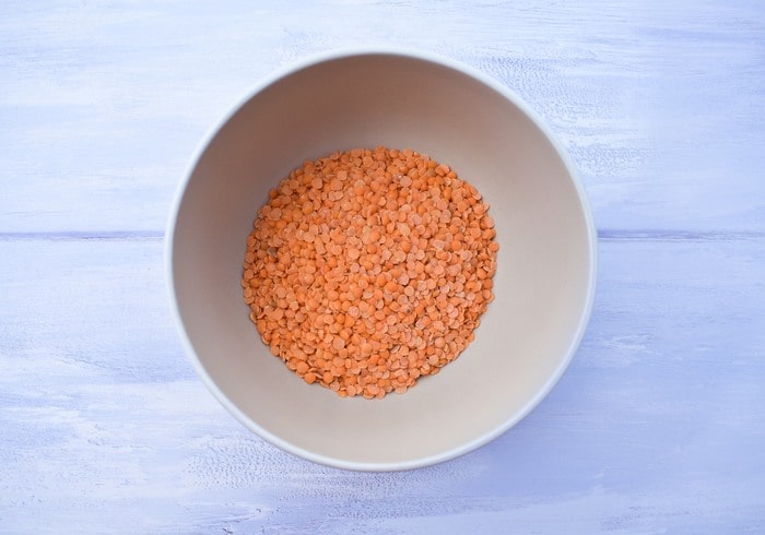 bowl of uncooked red lentils