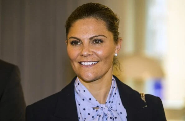 Crown Princess Victoria is wearing Af Klingberg boots, Tiger of Sweden Molena blazer, Valentino shoulder bag, polka dot blue silk blouse