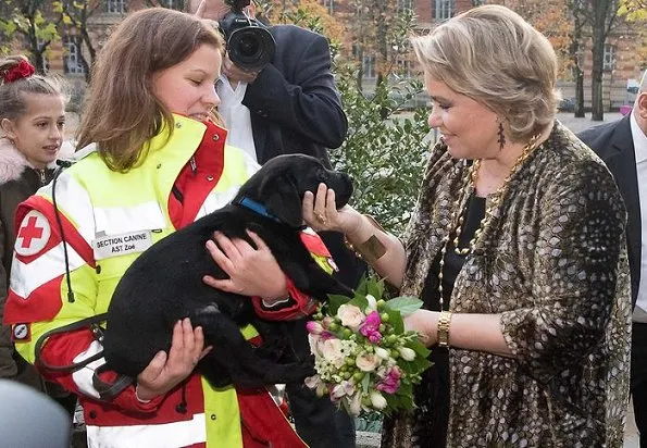 Grand Duchess Maria Teresa visited the 71st Red Cross Bazaar held at Victor Hugo Hall in Luxembourg. printed coat