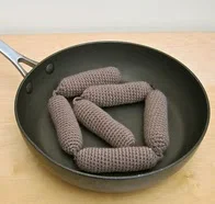http://www.ravelry.com/patterns/library/six-fat-sausages