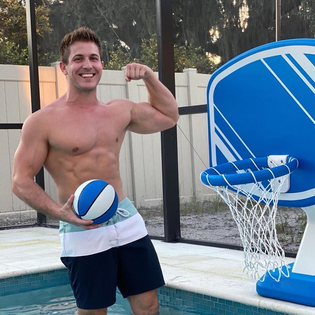 fit-handsome-shirtless-muscular-american-daddy-sexy-body-biceps-flex-pool-basketball-smiling-dilf