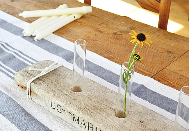 driftwood centerpiece with test tubes