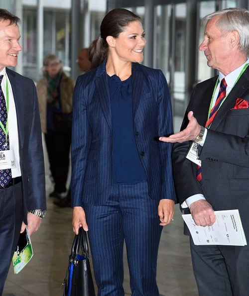 Crown Princess Victoria carried Dagmar Taylor Tote Bag, Ralph Lauren Suede Celia Pump and Malene Birger blouse. Charlotte Bonde Sthlm Louise Ribbon Earrings