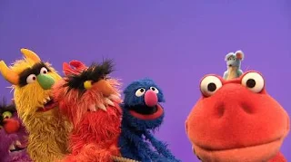 Grover, Frazzle and some monsters are trying to pull a rope. mouse, dinosaur, Sesame Street Episode 4419 Judy and the Beast season 44