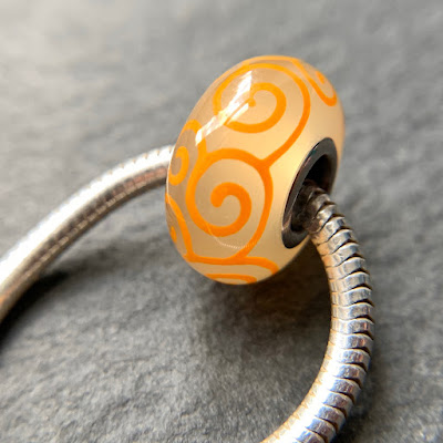 Handmade lampwork glass silver core big hole charm bead by Laura Sparling made with CiM Lemongrass