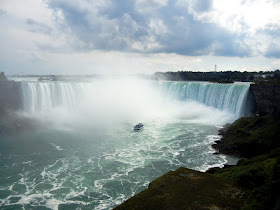 A Maid of the Mist heading under Horseshoe Falls at Niagara Falls A Maid of the Mist heading under Horseshoe Falls at Niagara Falls