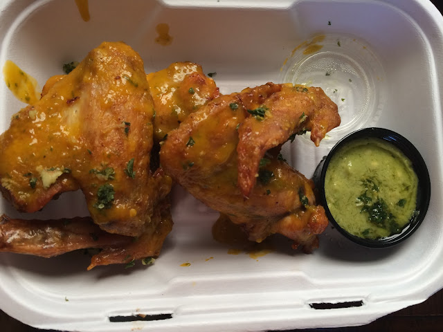 Spicy Mango Wings at Fritai Haitian Street Food in St. Roch Market in New Orleans Bywater
