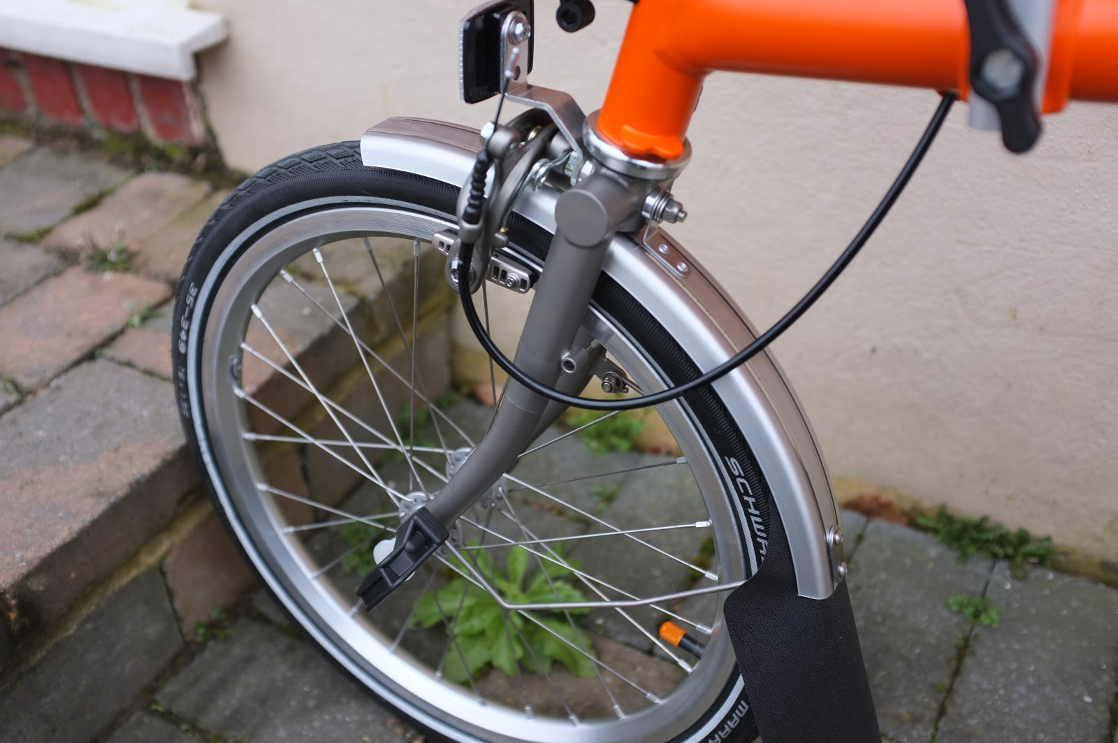 Brompton orange 2025 titanium