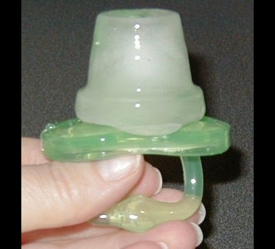 You can place a pacifier in a filled ice cube tray and freeze it to soothe teething gums!