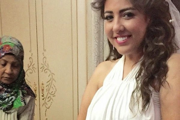 مي كساب عروس بفستان أبيض