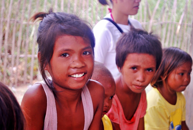 Young girl smiling at the camera