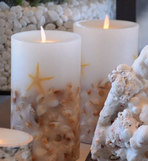 Give plain pillar candles a beachy look with sand and seashells