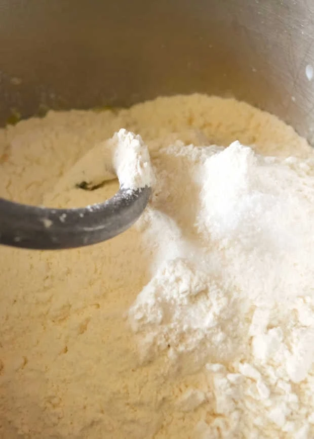 Orange Cinnamon Rolls add flour and salt to make dough.