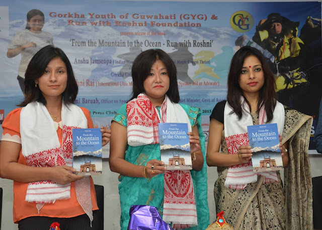 Anshu Jamsenpa (L) Mountaineer who climed Mount Everest thrice and Pomi Baruah (R) OSD to CM, Govt. of Assam relaesing Roshni rai's book at Gauhati Press Club on saturday.jpg