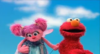 Abby and Elmo pretend to drive cars. Sesame Street Elmo's Travel Songs and Games