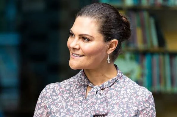 Crown Princess Victoria wore a Pattriina floral print long dress from Andiata and Victoria wore an Odnala  wool cashmere jacket from Andiata