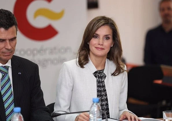 Queen Letizia wore Carolina Herrera blouse, Hugo Boss pantsuit at Spanish Cooperation Agency in Dakar