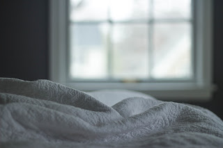 Image of bed with bright window get more sleep, image of bed
