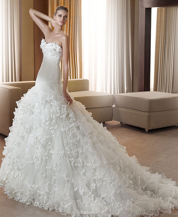 This Pronovias dress is a total stunner Ruffles and lace all in one