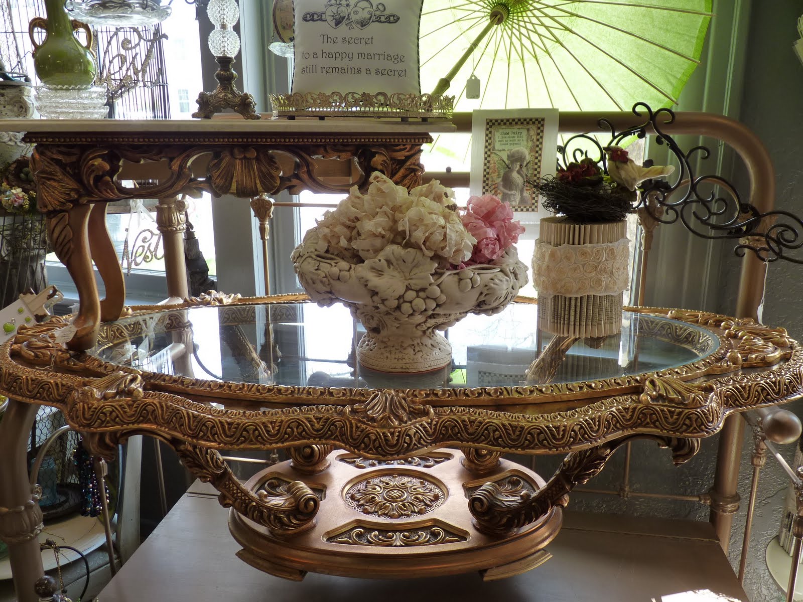 Just a bed of Roses Gold tables and Vintage mirrored towel bar