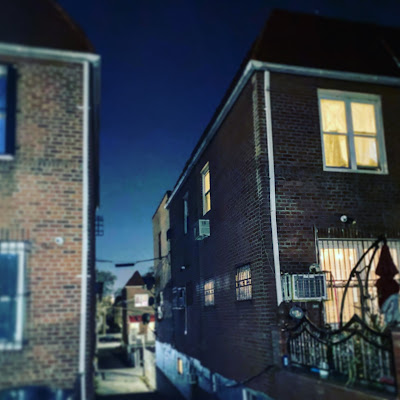 An alley between two residential buildings in East Elmhurst, Queens