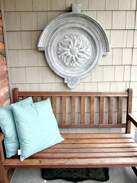 Outdoor wall hanging , teak bench and pillows