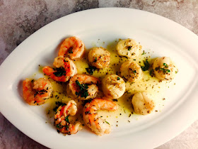 Light lemony flavor combined with bright herbs bring these grilled shrimp and scallops to a whole different level that just screams summer!   - Slice of Southern