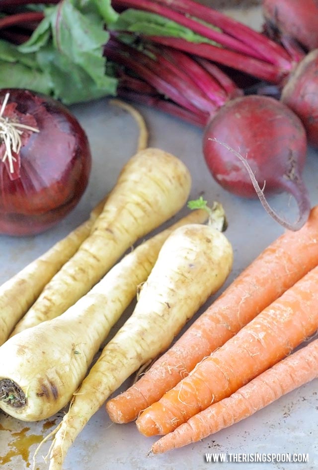 An easy roasted root vegetables recipe with beets, parsnips, carrots & onions tossed in cooking oil, seasonings, and balsamic vinegar then cooked until tender and slightly caramelized. This method makes the vegetables taste amazing with hardly any work!