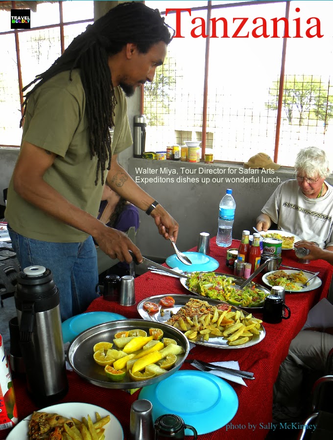 Walter Miya, Safari Arts Expeditions serving food. Photo Sally McKinney for TravelBoldly.com