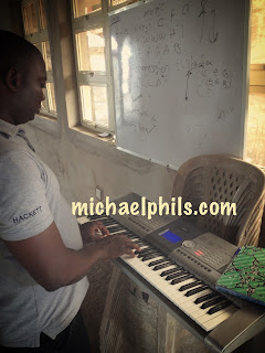 NIgerian learning the piano