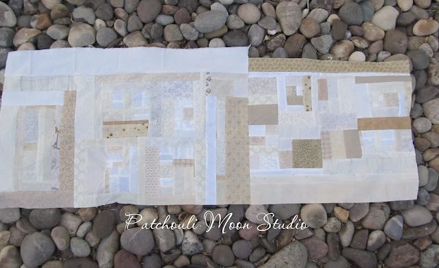 Scrappy pieced background fabric for table runner in white and off white fabrics