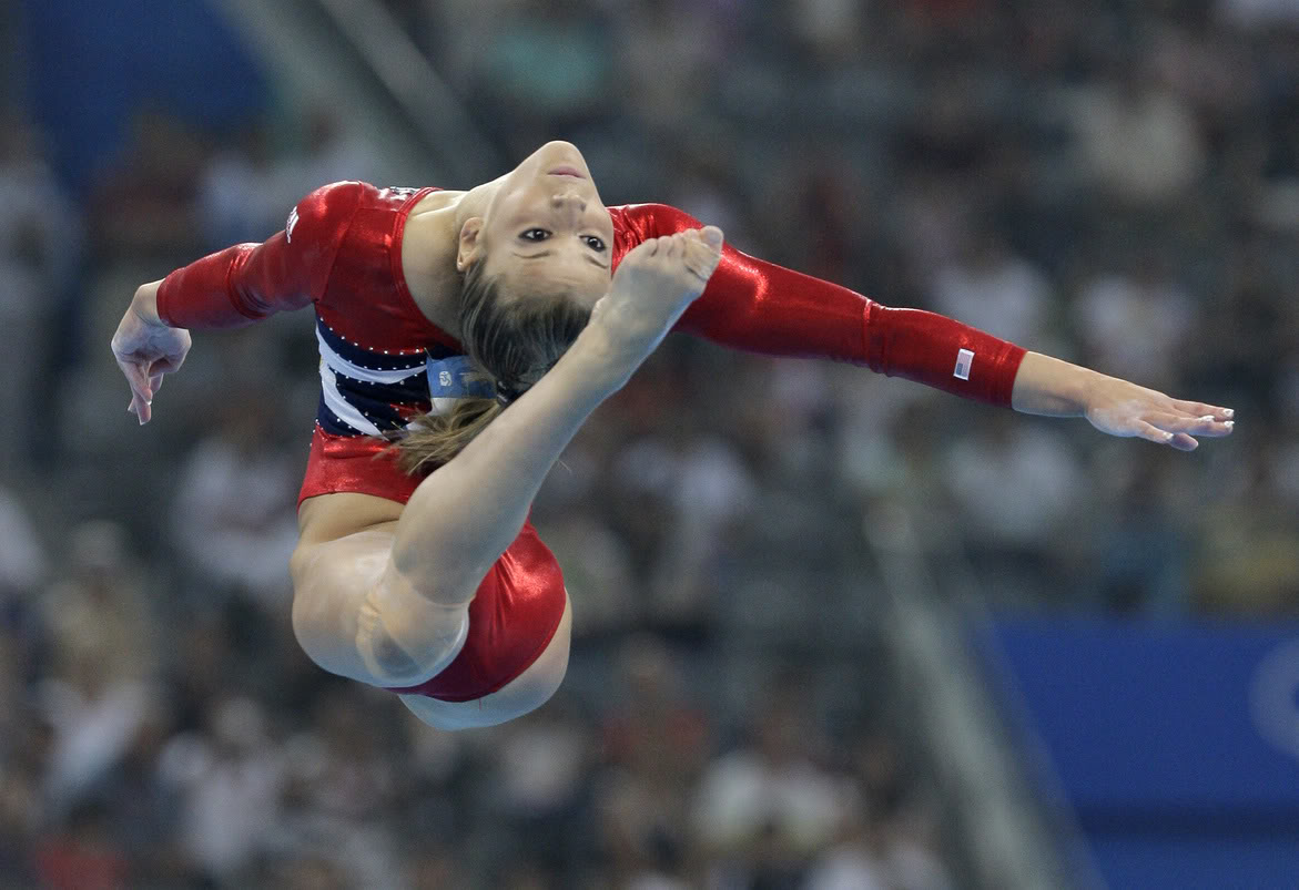 Спортивная гимнастика участники. Nastia Liukin гимнастка. ОИ 2008 спортивная гимнастика. Спортивная гимнастика на Олимпийских играх.