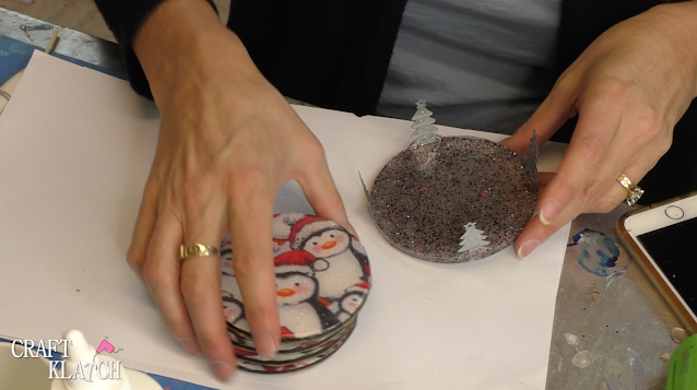 Learn how to make penguin fabric coasters! It's a great Christmas craft idea and beautiful home decor for the holidays! #craftklatch #craftideas #christmas #christmascraftideas #crafts #christmascrafts #howto #diy #penguins #resin #resincrafts #resincoasters #resindiys