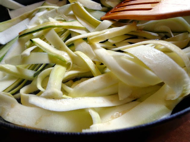 saute zucchini ribbons in garlic butter