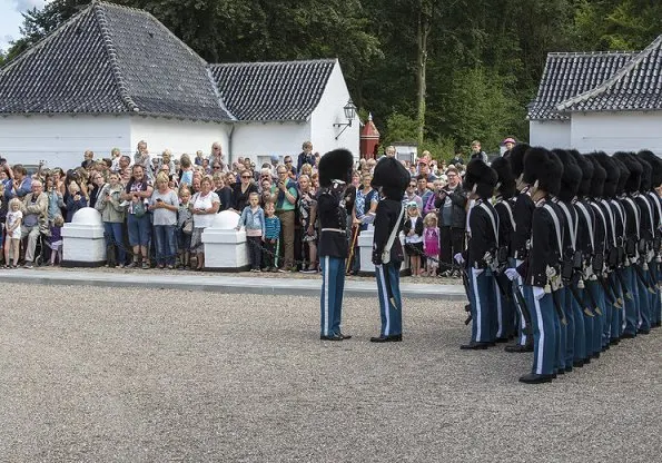 Queen Margrethe and Princess Benedikte attended ceremony of guard changing held at Grasten Palace. Princess Mary