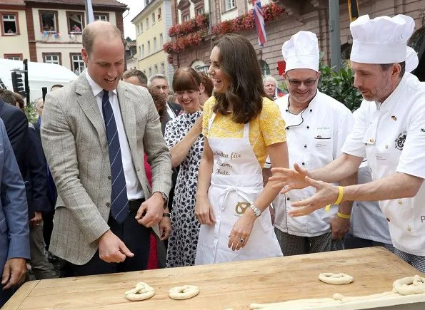 The Duchess wore Jenny Packham Yellow Dress for Heidelberg visit. Kate's wearing her Monsoon Fleur wedges