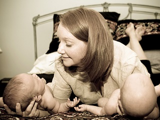 Image: Happy mom with twins, by Joelle Inge-Messerschmidt, www.photographybyjoelle.com, on Flickr
