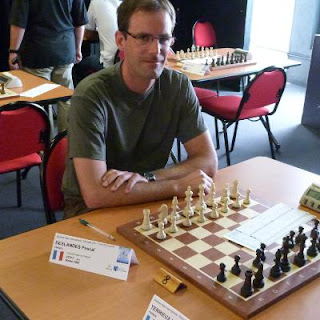 Pascal Deslandes réalise sa norme de MI une ronde avant la fin du tournoi © Chess & Strategy