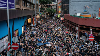 Hong Kong protesters attempt to restore peace after weeks of violence