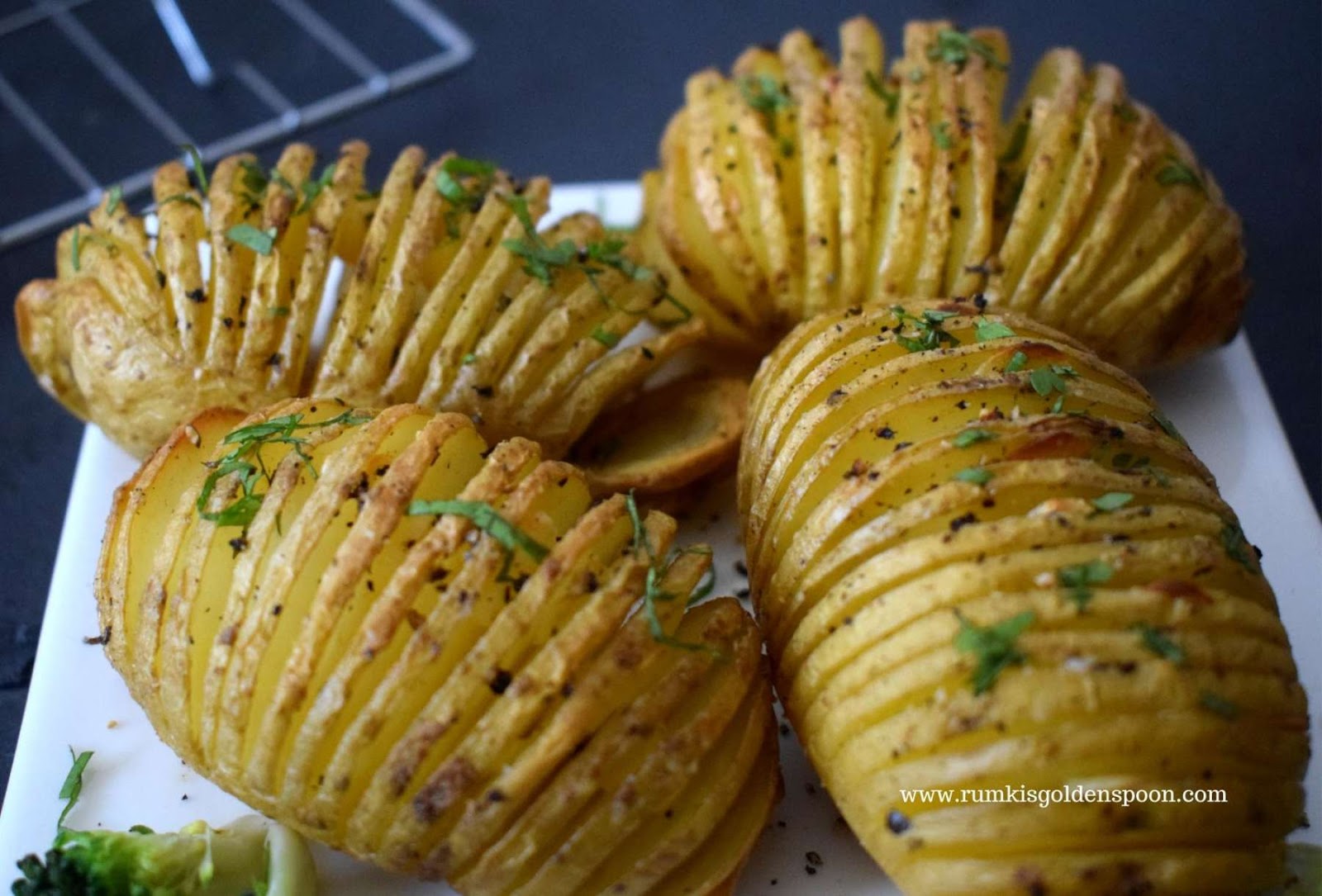 hasselback potatoes, hasselback potatoes recipe, recipe for hasselback potatoes, how to make hasselback potatoes, hasselback potatoes garlic, garlic butter hasselback potatoes, hasselback potatoes with garlic, potato recipe baked, potato recipes, potato recipe easy, potato recipe for oven, potato recipes baked in oven, Rumki's Golden Spoon