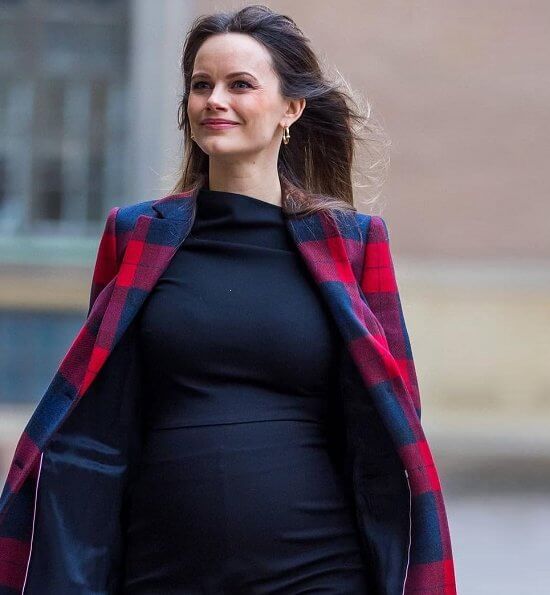 Princess Sofia wore a new plaid wool coat from Tommy Hilfiger, and a black arcelia dress from Dagmar, and leather boots from Zara. Gold earrings