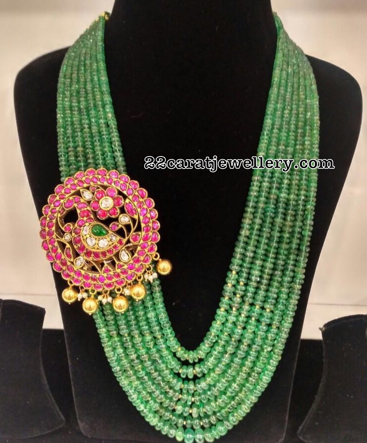 Seven Strings Emerald Beads Set with Locket Jewellery Designs